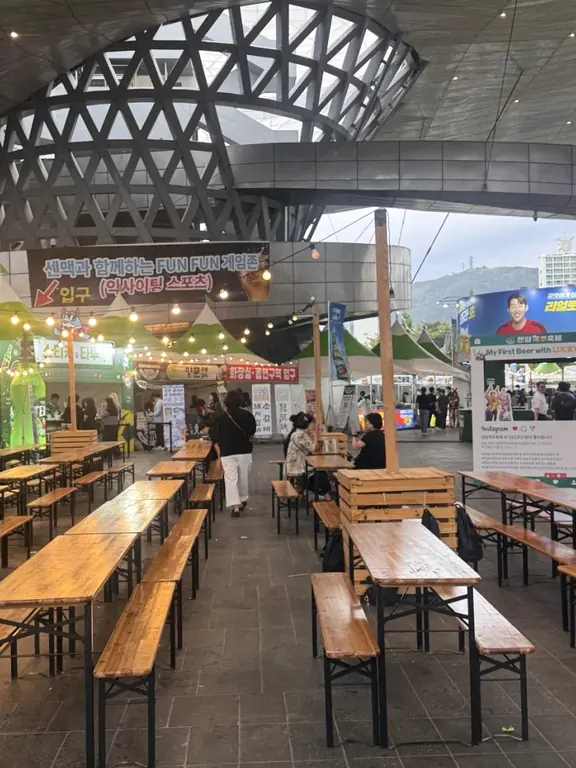 Wooden picnic tables at beer festival