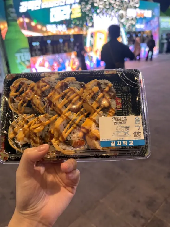 Salmon cheese rolls takeout container