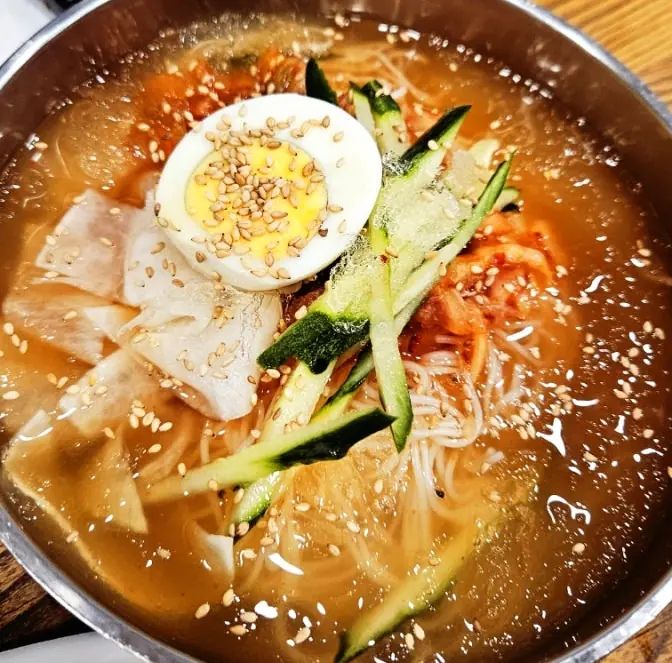 Refreshing Korean cold noodle soup bowl
