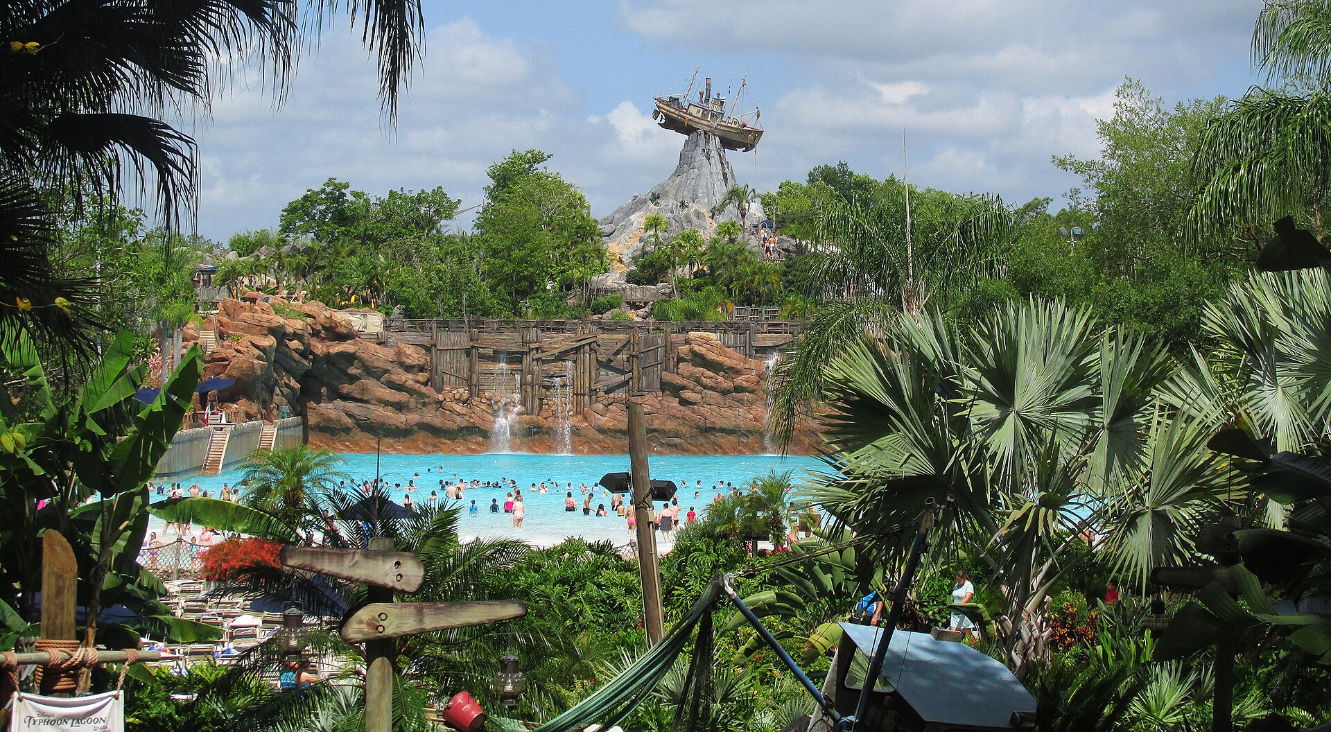 Mount Mayday at Disney's Typhoon Lagoon water park at Walt Disney World, with the Miss Tilly shipwreck stranded on its peak above the surf pool.