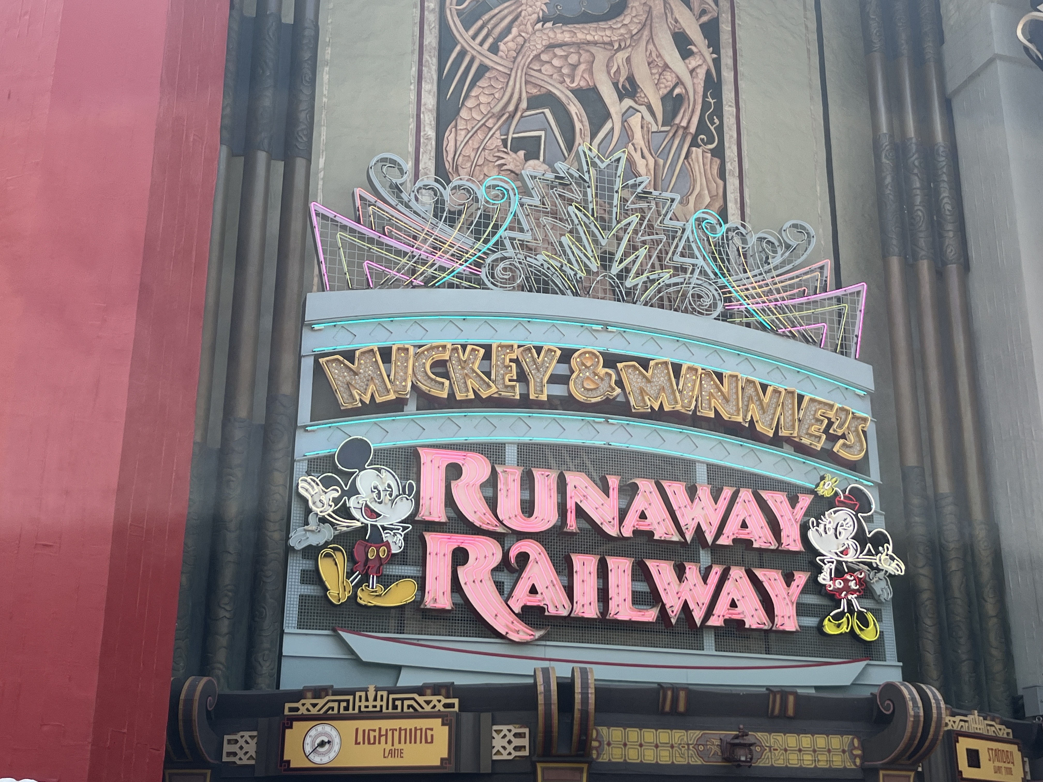 The colorful entrance marquee for Mickey & Minnie's Runaway Railway at Disney's Hollywood Studios.