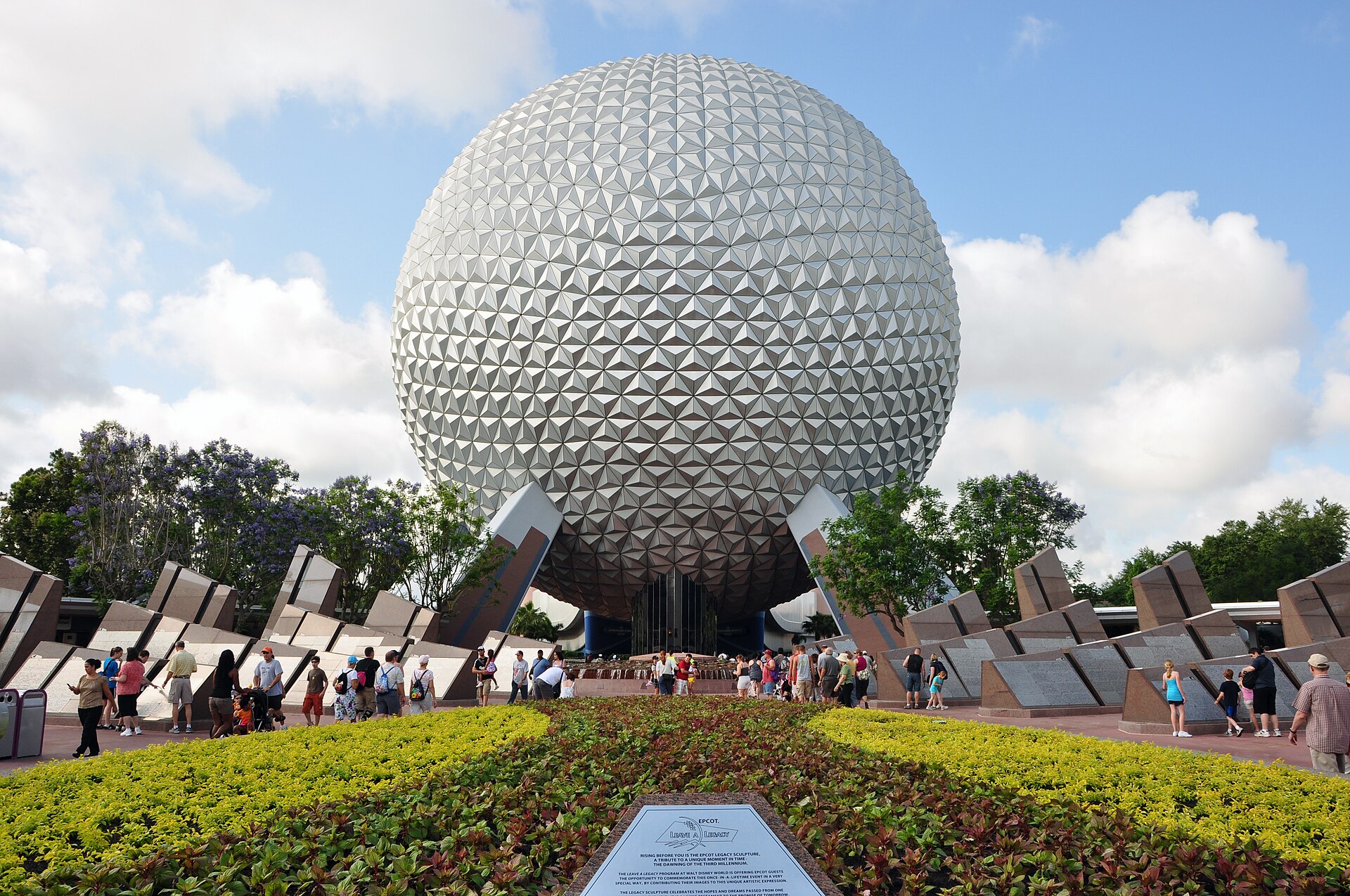 Spaceship Earth, the geodesic sphere at the entrance to EPCOT at Walt Disney World, seen head-on from the entrance plaza on a sunny day.