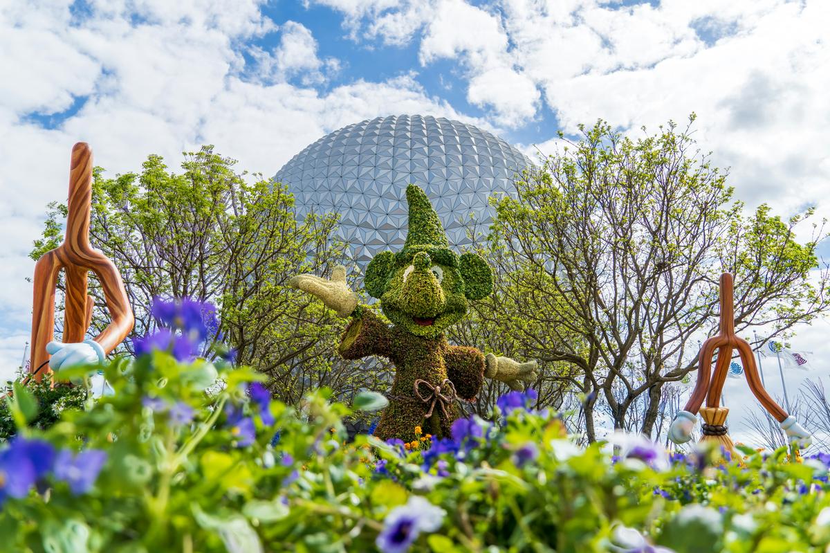 Mickey Mouse topiary in front of Spaceship Earth at EPCOT during the Flower and Garden Festival at Walt Disney World