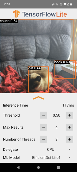 App example showing UI controls. Highlights a cat, a book, and a couch.