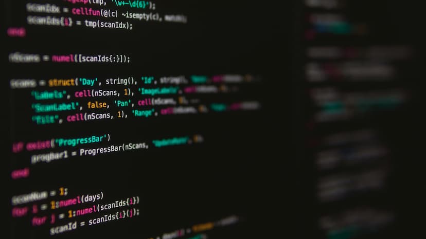 Code on a developer's screen in the dark