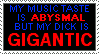 postcard blinkie: my music taste is ABYSMAL but my dick is GIGANTIC