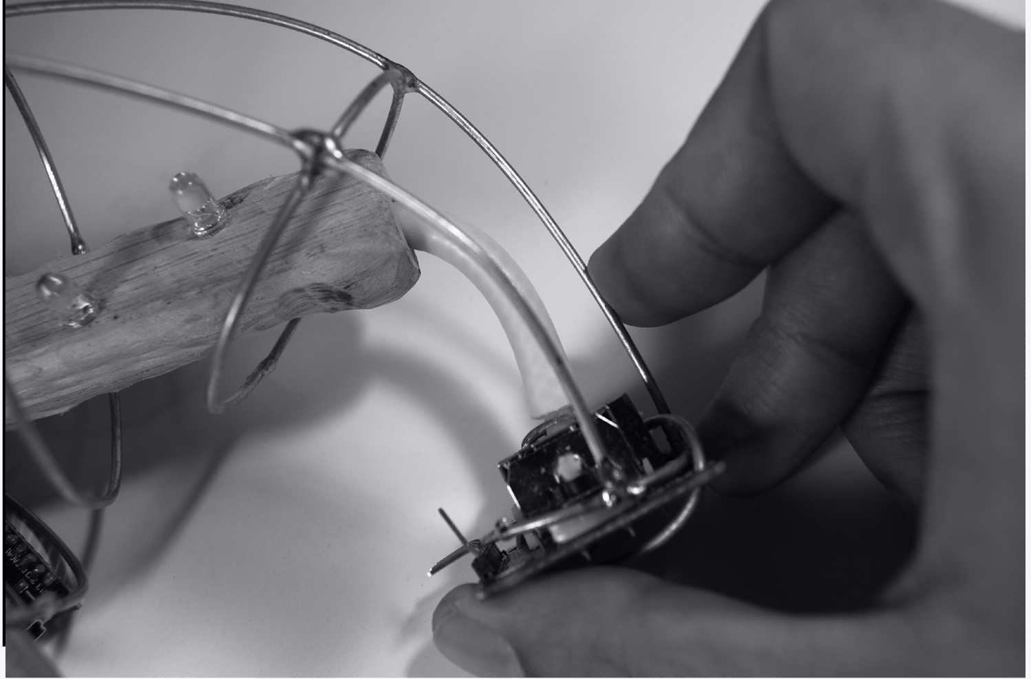 Wire frame with wooden handle
