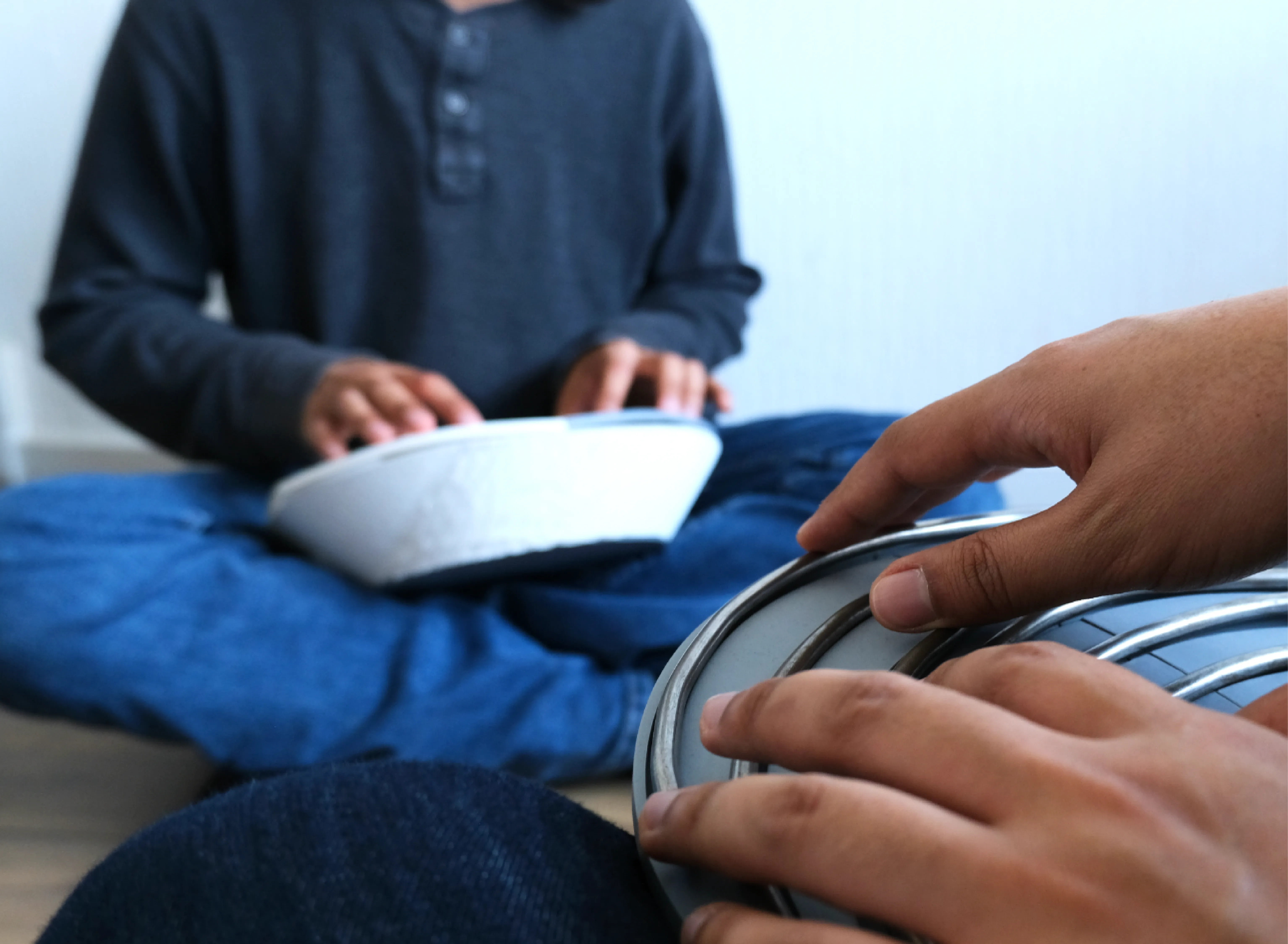 Two people playing Reharp together