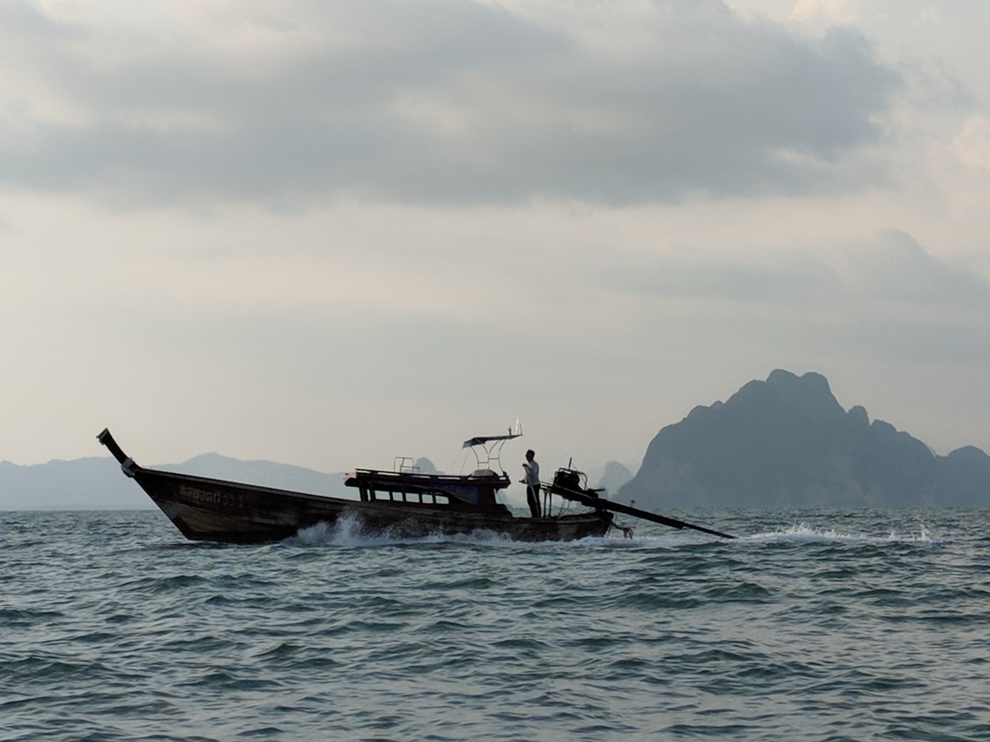 A longtail boat on the sea near Koh Yao Noi, Thailand