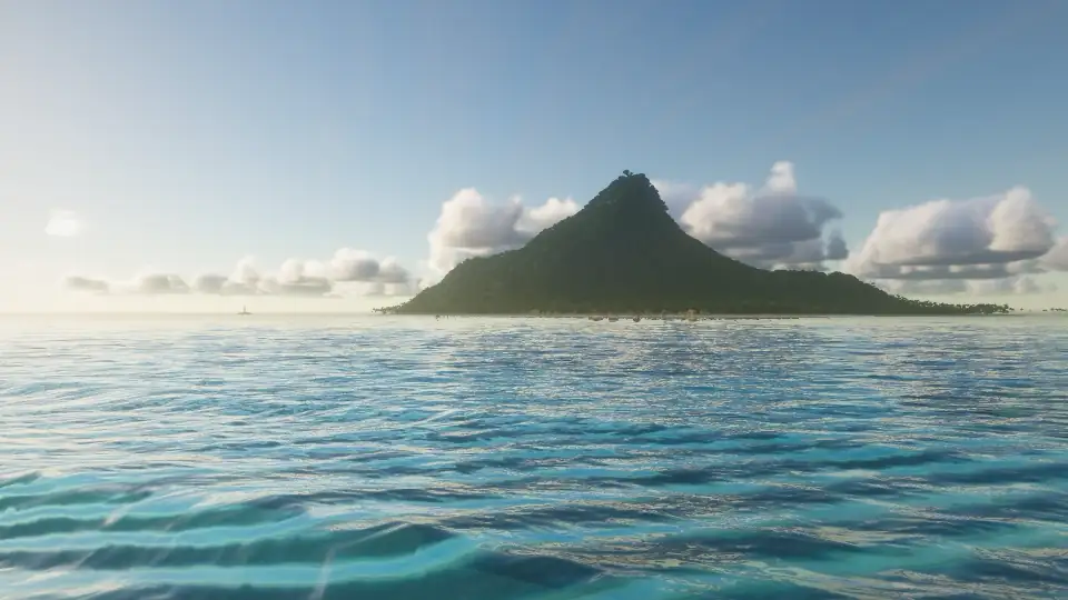 The camera skims the open sea at the reef edge, then climbs to reveal the island, its lagoon and the pier
