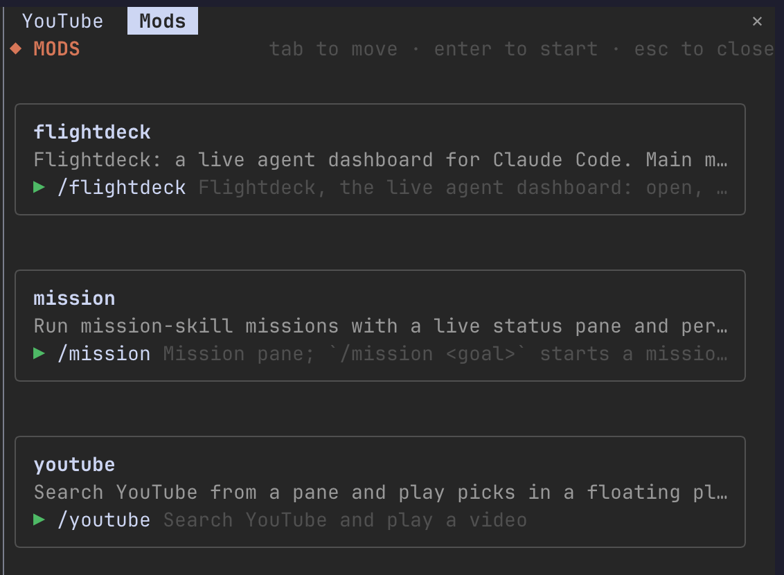 The mods menu open in a Claude Code pane, with a card for each mod (flightdeck, mission, youtube) and its slash command