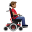 man_in_motorized_wheelchair_facing_right