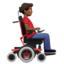 man_in_motorized_wheelchair_facing_right