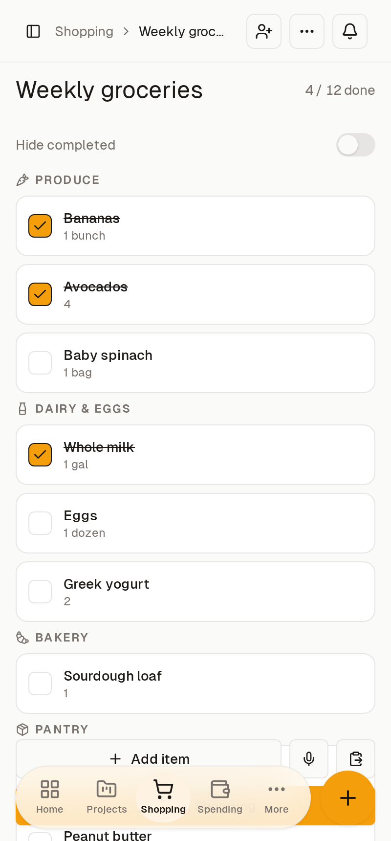 A shared grocery list grouped by aisle