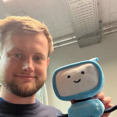 Magnus Steinmeier Olsen with the blue IT mascot