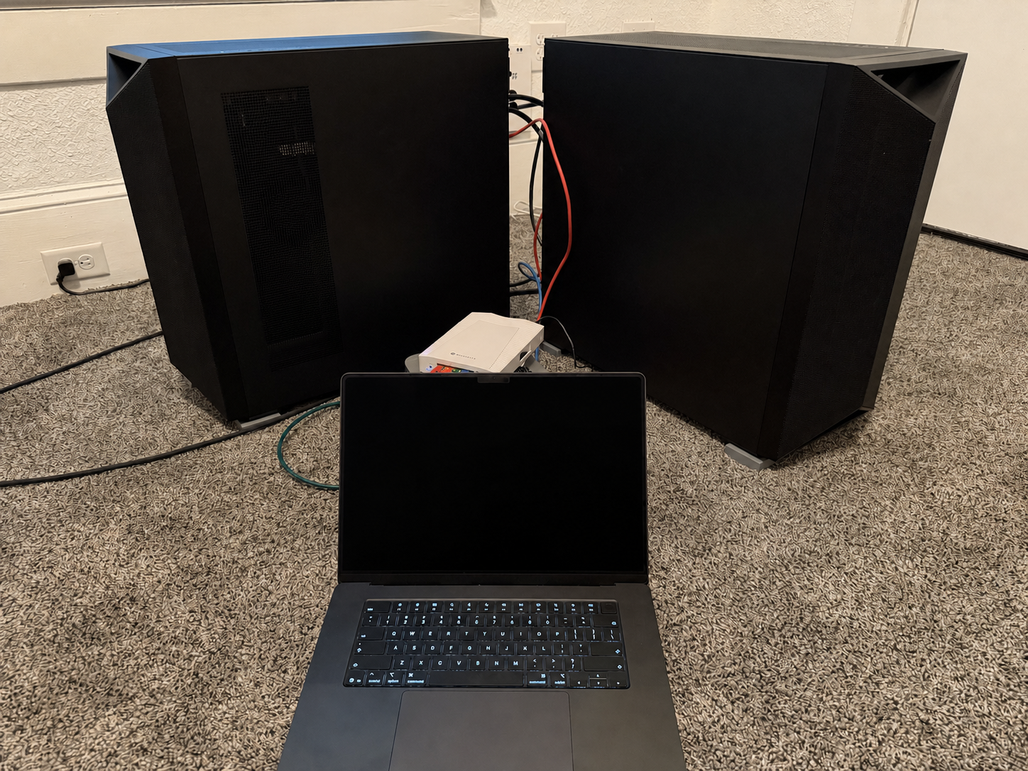 Two NVIDIA DGX Stations connected for distributed inference