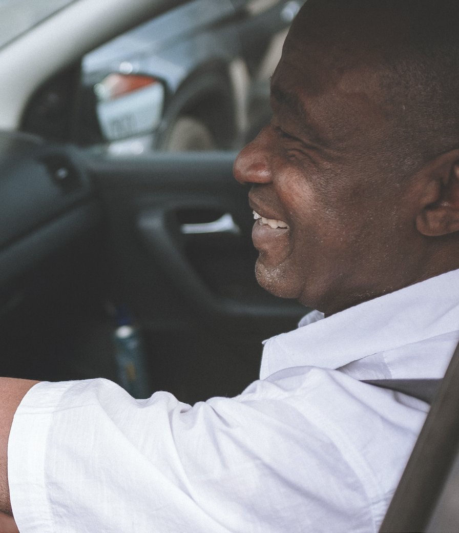 A HUM driver using the HUM driver app on a smartphone