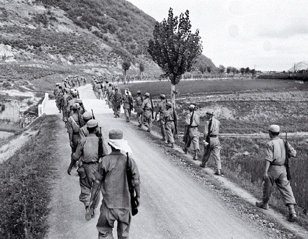 Republic of Korea soldiers march toward the front during the Pusan Perimeter fighting, August 1950
