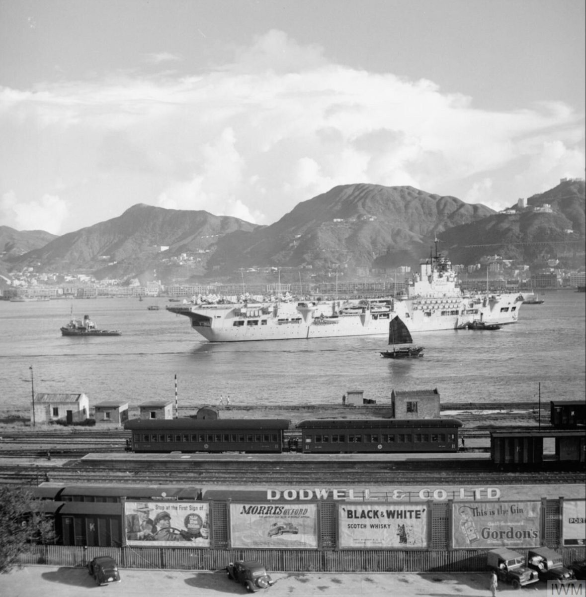 HMS Unicorn leaves Hong Kong for Pusan carrying men of the Middlesex Regiment, September 1950 — a follow-up lift for the brigade whose first contingent landed August 29