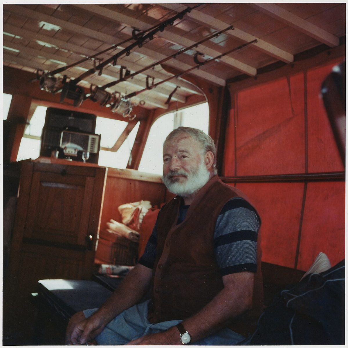 Ernest Hemingway aboard his boat Pilar in 1950, the year of Across the River and into the Trees