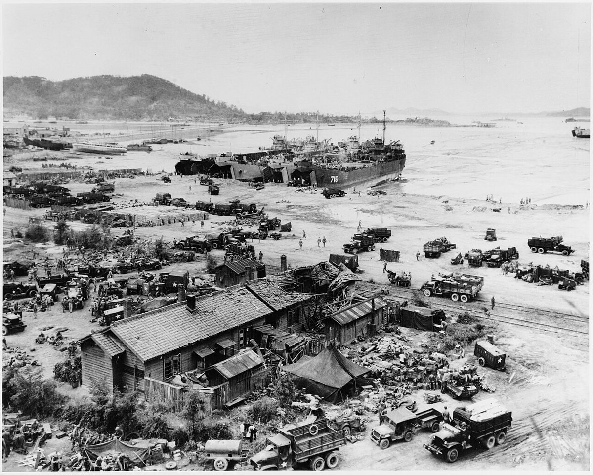 Four LSTs unload men and equipment on Inchon's Red Beach at low tide, September 16, 1950