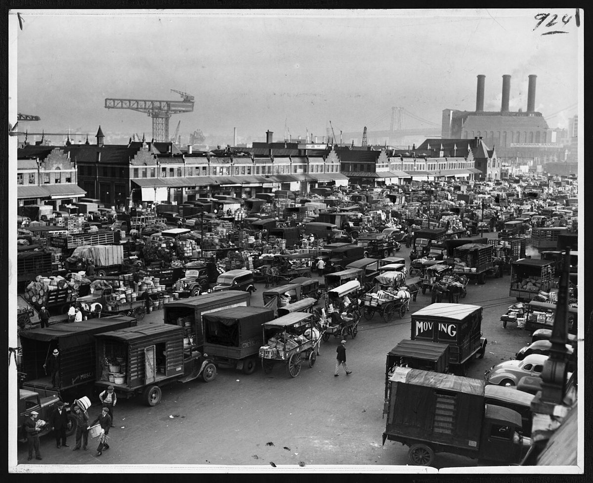 Trucks and horse-drawn carts jam Brooklyn's Wallabout Market, September 1940 — the workaday Brooklyn streetscape of the era