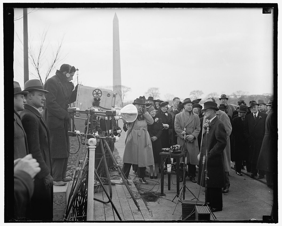 An FCC chairman faces a television camera on the National Mall during early TV demonstrations, 1939 — eleven years before the commission approved CBS color