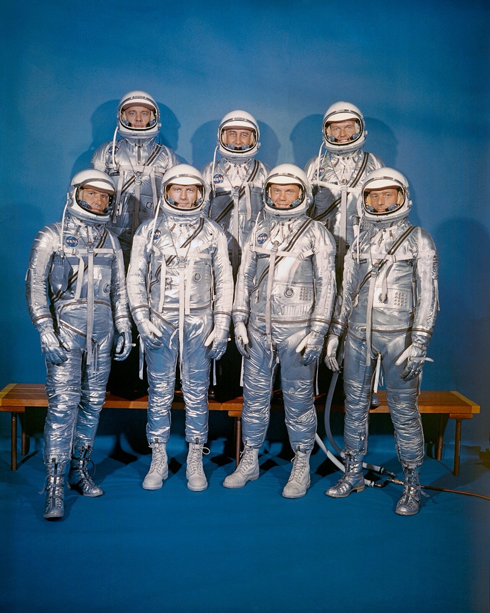 The Mercury Seven, NASA's first astronaut group, photographed in pressure suits in 1960