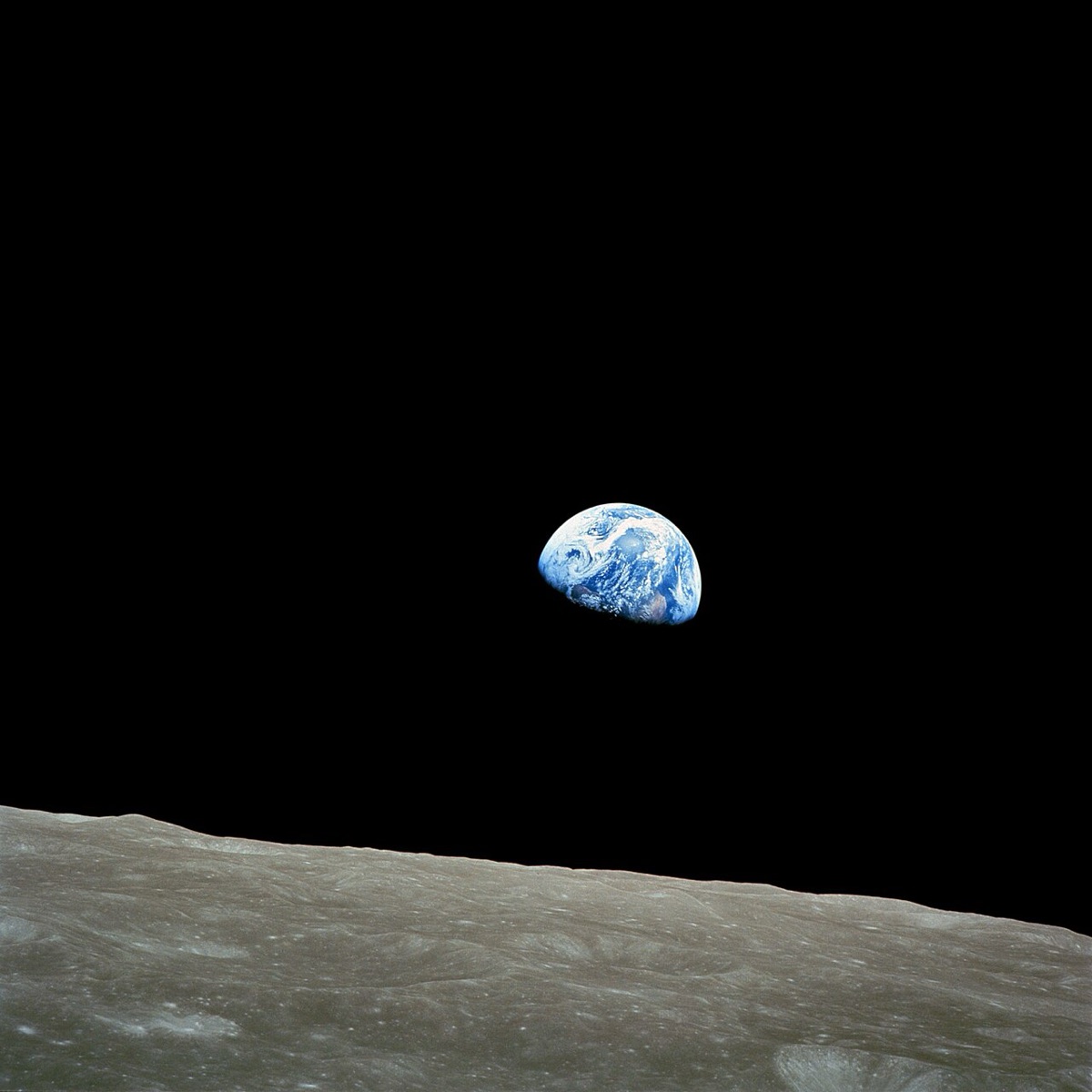 Earthrise, photographed from lunar orbit by the crew of Apollo 8 on December 24, 1968