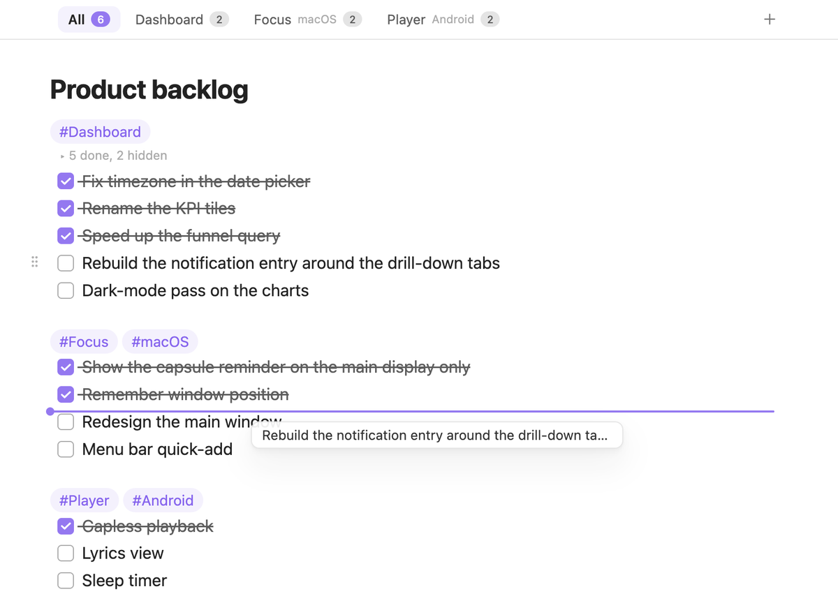 Dragging a task towards another section, with the drop indicator and the drag ghost