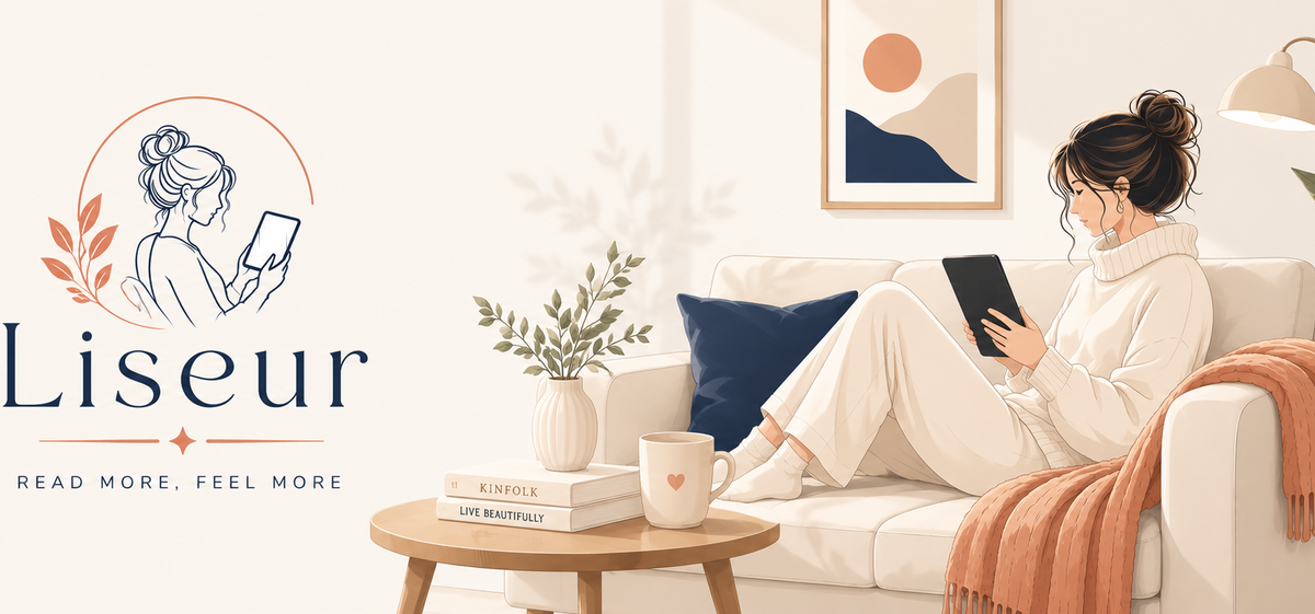 A woman reading on a couch under a lamp