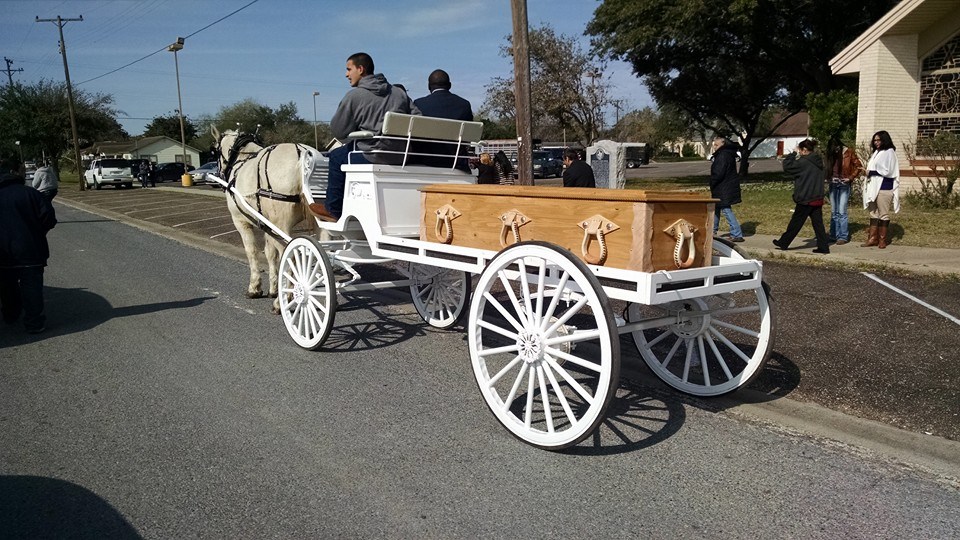 Horse-drawn caisson at cowboy funeral in Falfurrias Texas