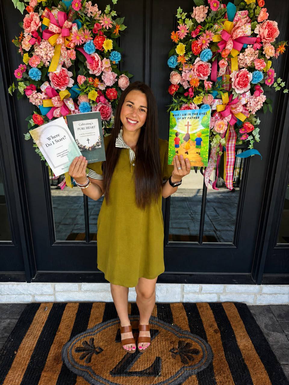 MaCarly Zoellick holding her three books