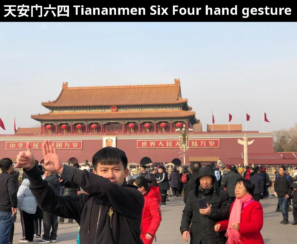 Tiananmen six four hand gesture