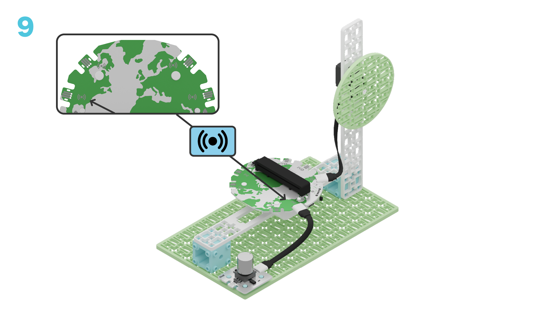 Snap the dial onto the left corner of the base plate. Connect its cable to one of the sensor ports on the breakout board.