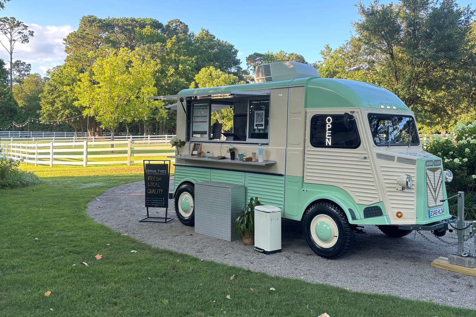 Common Tides mobile coffee trailer set up as a wedding coffee bar at Sycamore Bend Estate wedding venue in Wilmington NC