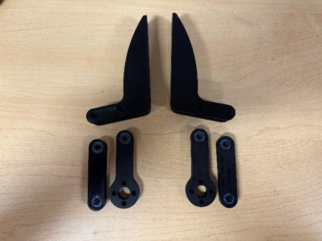 Fingers and rockers with bearings pressed in