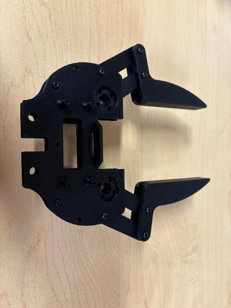 The top base screwed onto the assembly