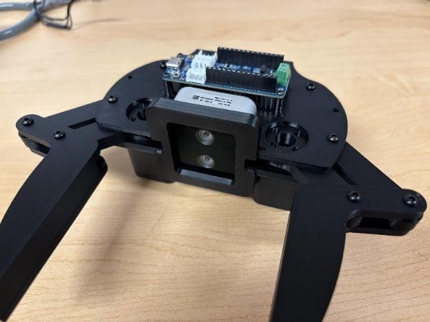 The camera protector fitted to the gripper