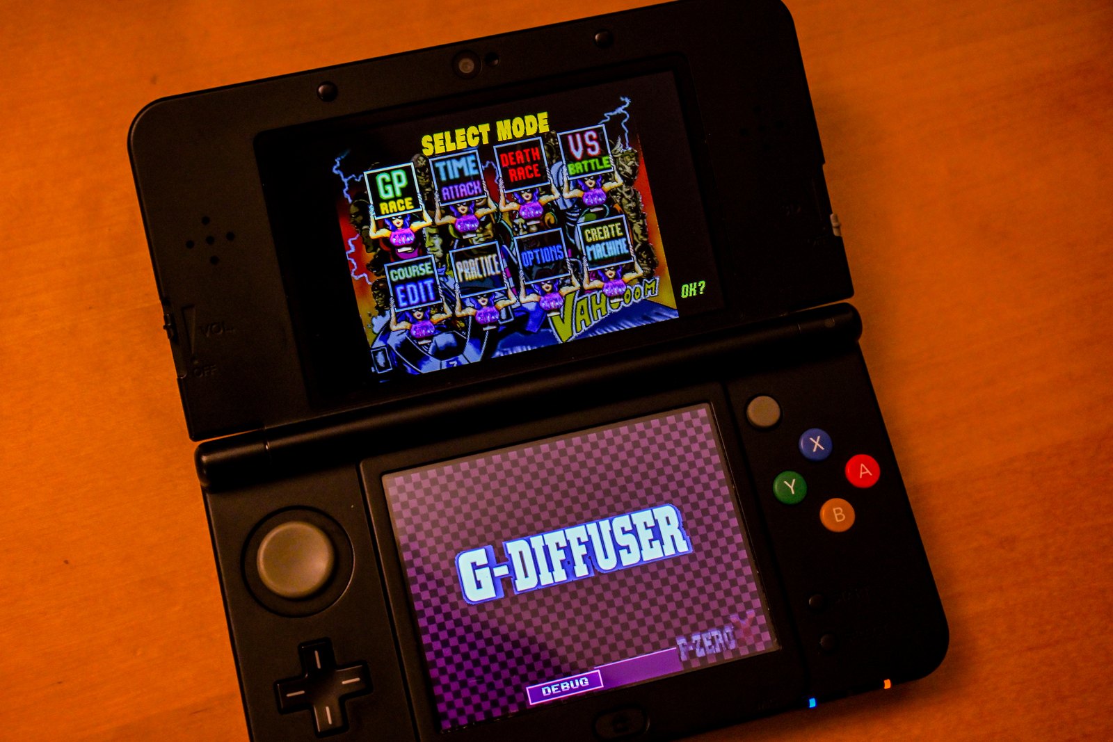v1.0 on a New 3DS: Select Mode with the Expansion Kit entries, the G-DIFFUSER idle view on the bottom screen
