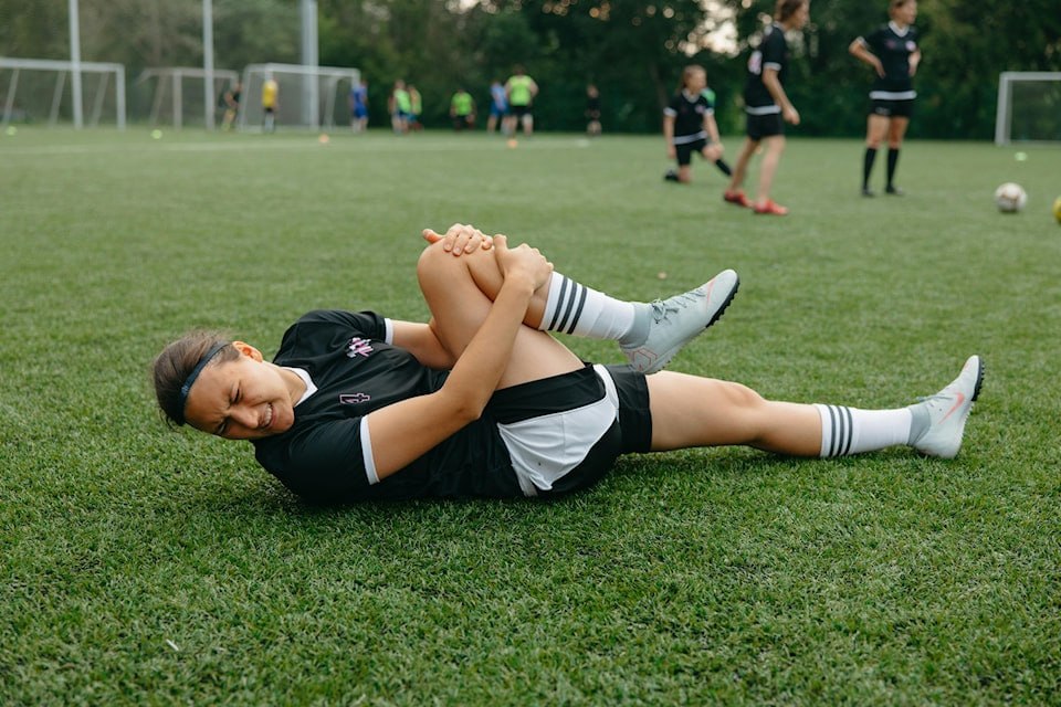 Athlete injured on field — Stride Acute Sports Injury Clinic