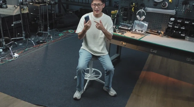 Scene 2: performer in a dark studio, short-focus view