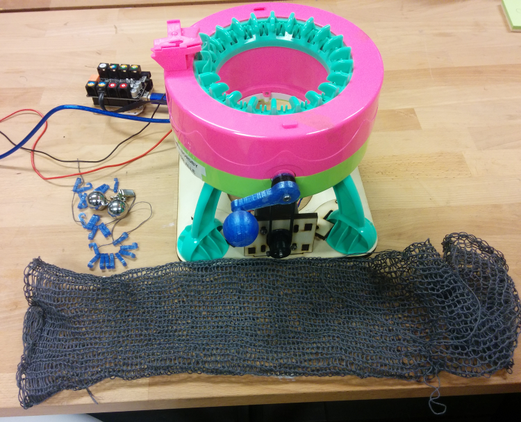 Generic circular knitting machine modified for automation using 3d-printed parts
