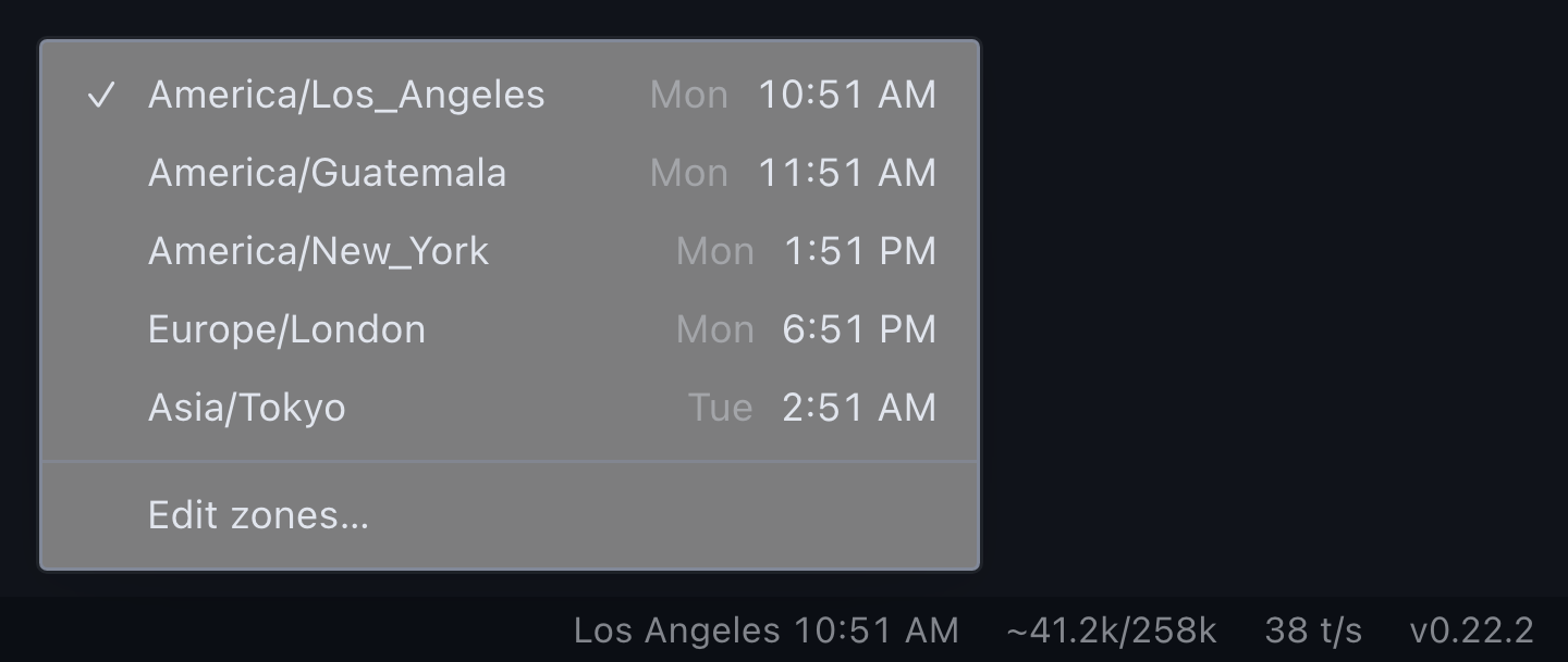 The drop-up menu: five zones with day and time, Los Angeles checked, Edit zones at the bottom