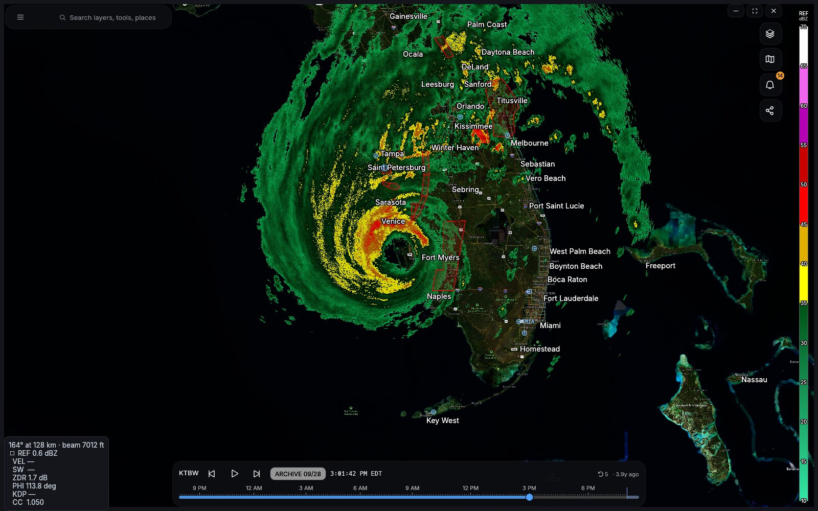A hurricane forecast cone and track drawn over the map with advisory text alongside