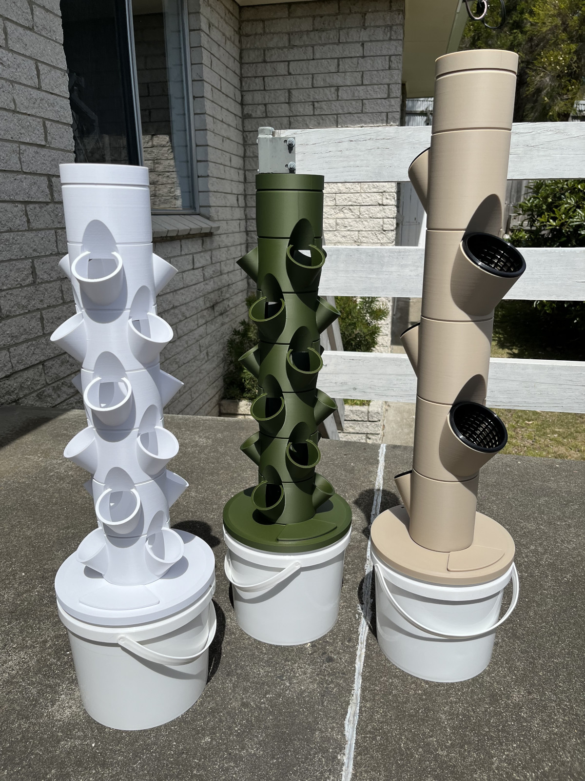 Image of three grow towers