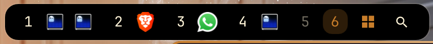 Workspace pills with per-app icons