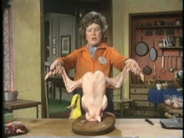 Julia Child dancing with a turkey