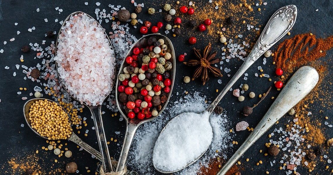 A photo of spices spread across a table