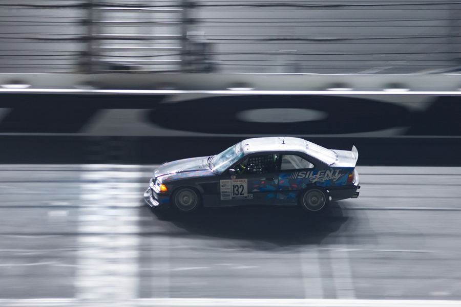 Silent Racing BMW E36 cornering at speed at Daytona